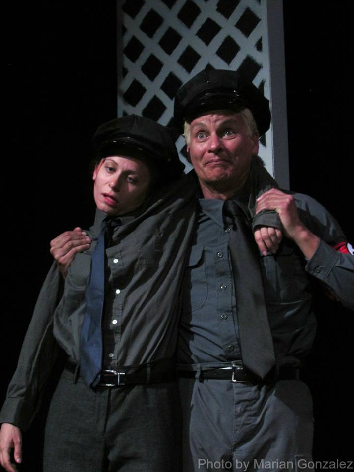 Barry has been shot by Hitler; a terrified fellow soldier puppets him to attention.  (L-R: Laura Napoli & Aaron Mendelson)